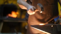 Blacksmith Forging a Sword in a Workshop Slow Motion
