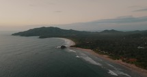 Panoramic Drone shot View Of Scenic Seascape And Lush Vegetation At Sunset In Guanacaste, Costa Rica	