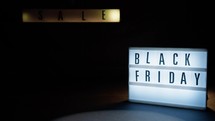 Black Friday signboards with copy space on left