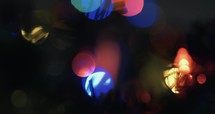 Abstract Christmas tree lights bokeh, blurred, holidays motion background.