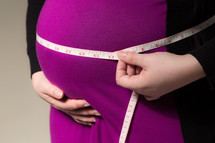 Pregnant Mom Measuring Tummy