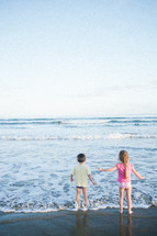 children playing at the beach 