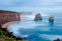 Great Ocean Road - the 12 Apostles in Victoria, Australia. Misty ocean bay with rocks.