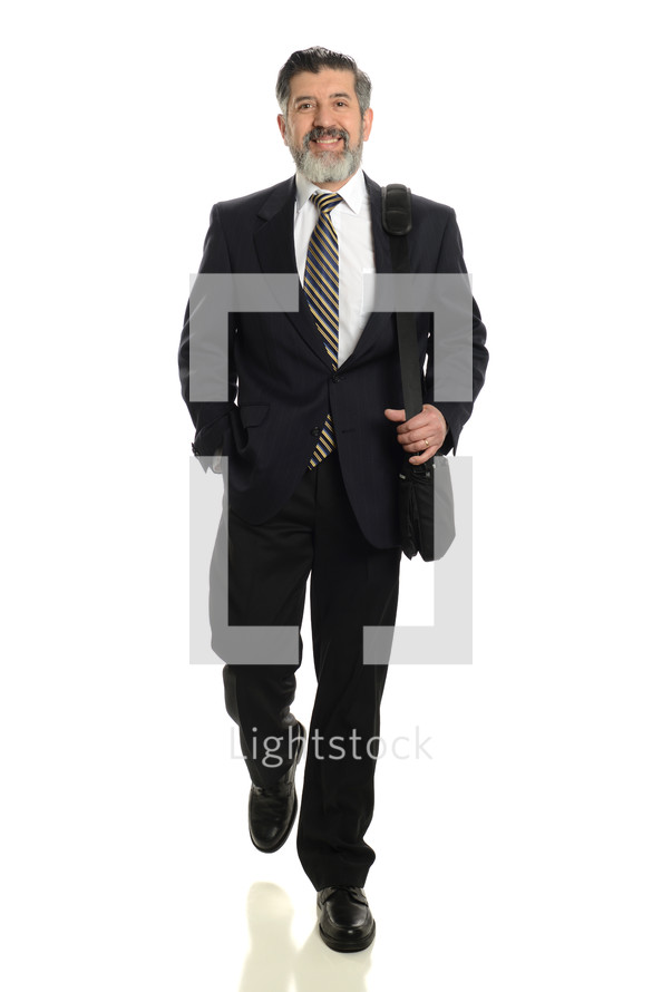 businessman with a briefcase walking 
