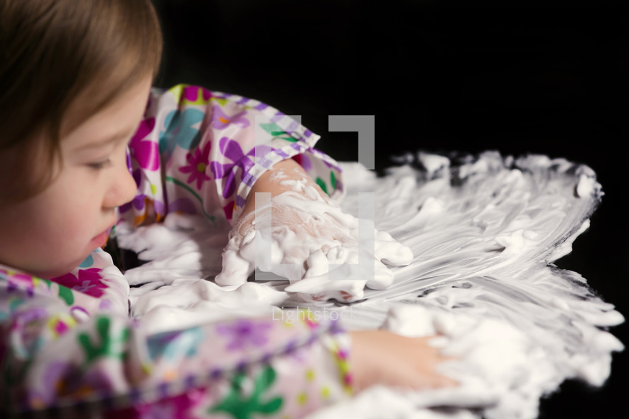 Toddler Playing with Foam and shaving cream 