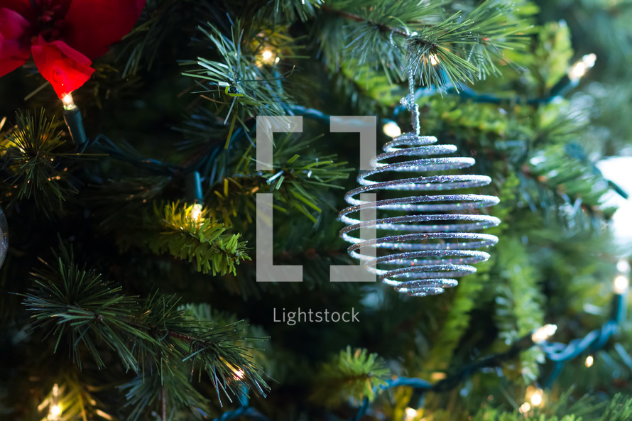 ornaments and lights on a Christmas tree closeup 