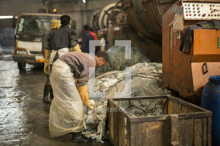 men working in a factory in Kenya 