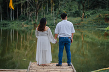 portrait of a couple outdoors holding hands 