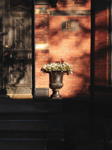 flower planter in front of a house 