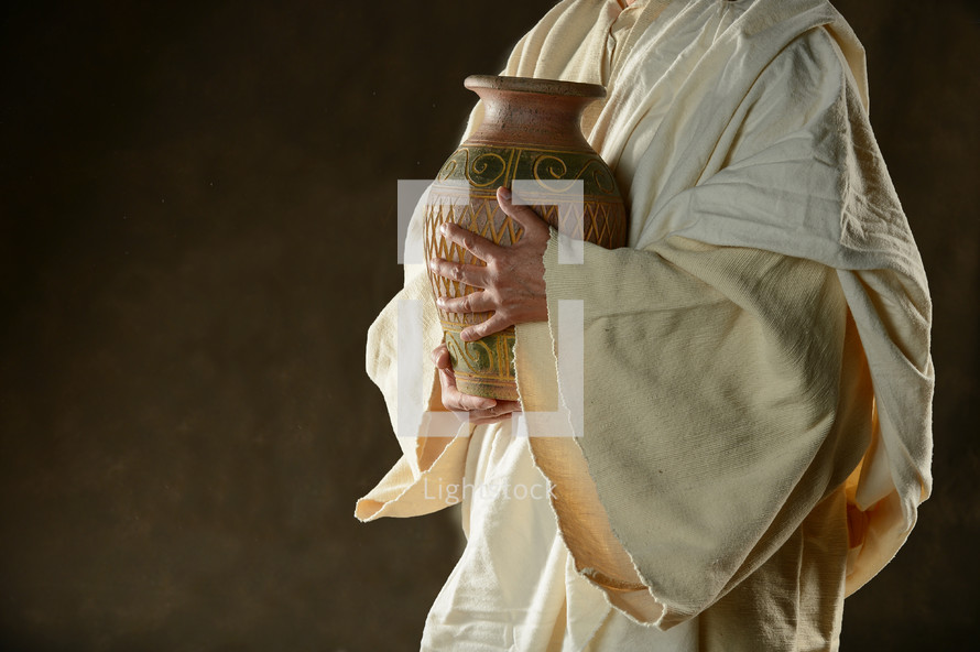 Jesus holding a jar 