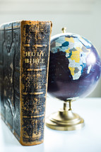 globe and Bible on a desk 