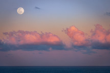 setting moon over the Atlantic Ocean. Florida, USA