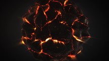 Glowing Lava Ball Against Black Background.	