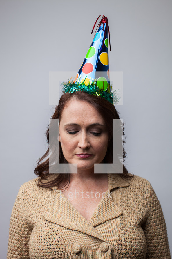 woman in a party hat 