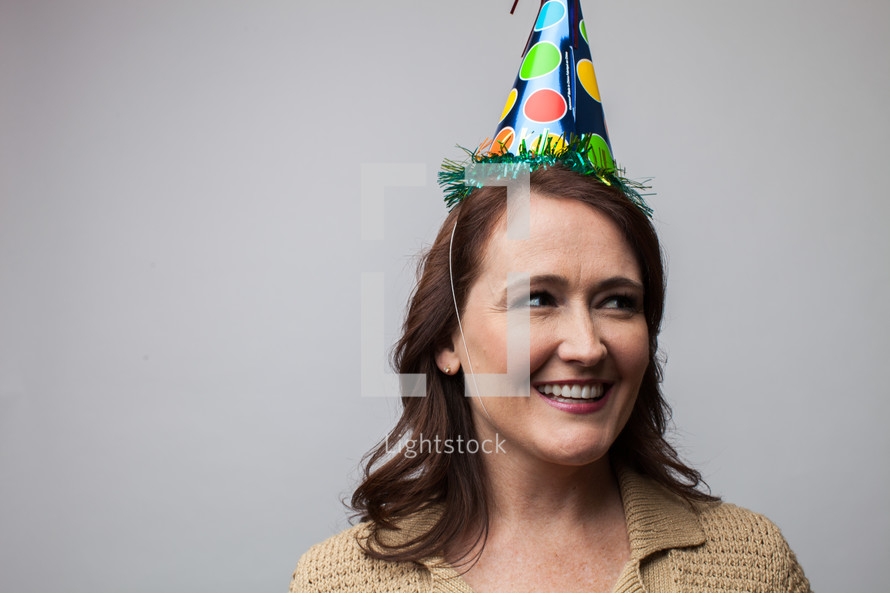 woman in a party hat 