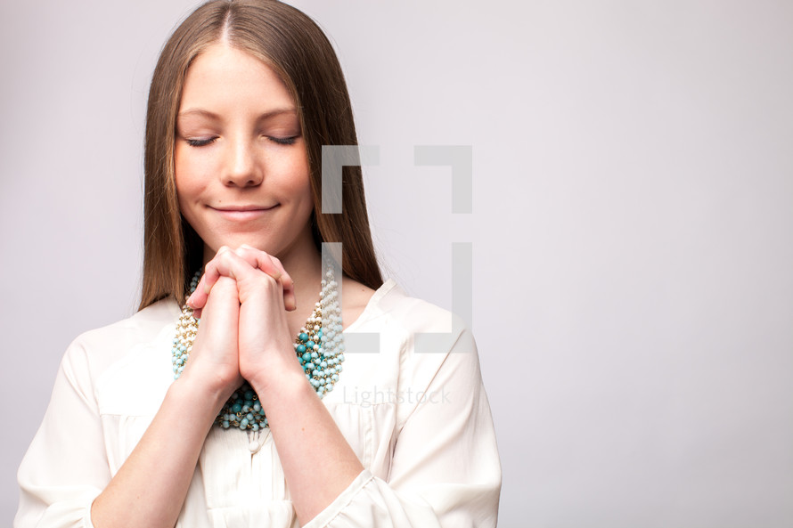 teen girl in prayer 