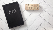 Bible on a white wood background - small group 