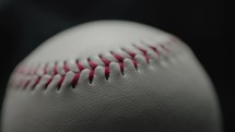 Dramatic, cinematic macro texture shots of a baseball