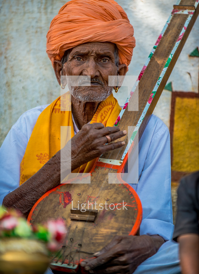 a musician on the streets of India 