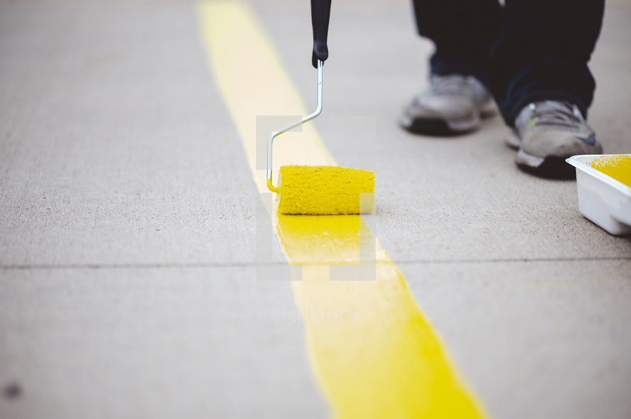 painting yellow stripes on concrete 