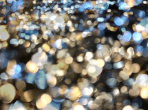 blue gold bokeh on black abstract lights