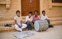 children in India playing a drum 