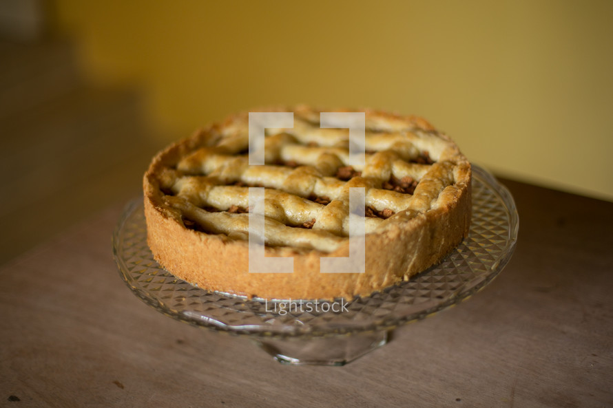 a pie on a cake stand 