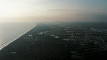 Aerial shot of Monterrico Beach With Nature Reserve In A Misty Early Morning In The Pacific Coast, Guatemala. 