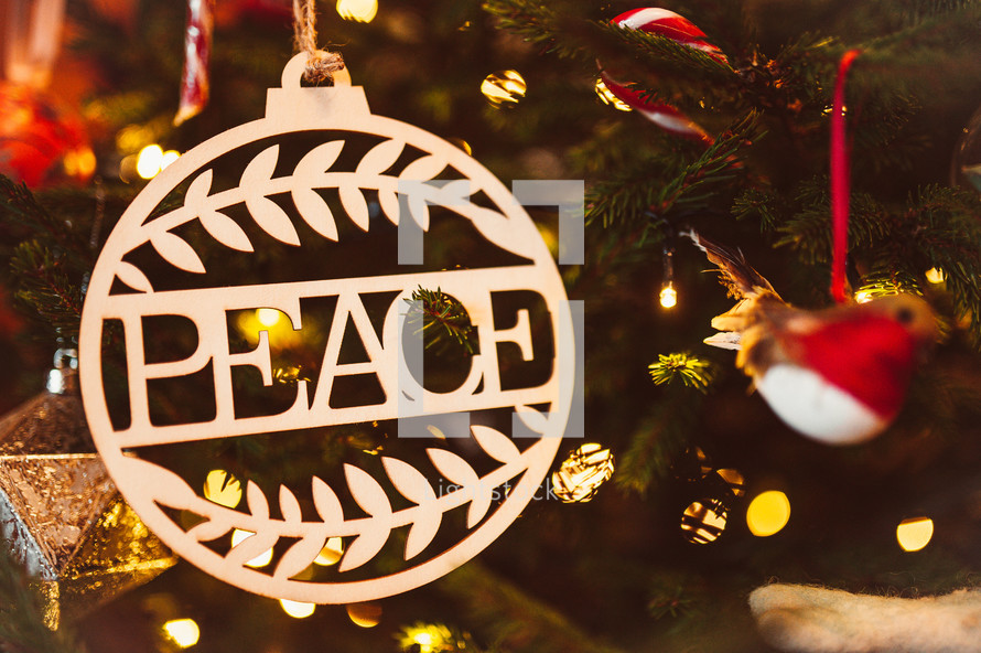peace ornament on a Christmas tree 