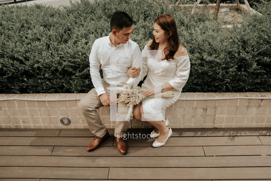 casual portrait of a bride and groom outdoors 