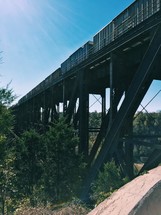 train crossing over a bridge 