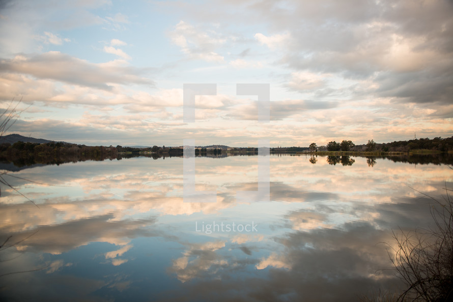 reflection of clouds on lake water in Canberra 
