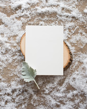 envelope on wood in snow 