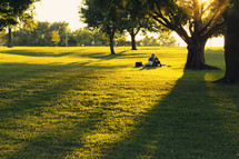 a couple enjoying a picnic in the park 