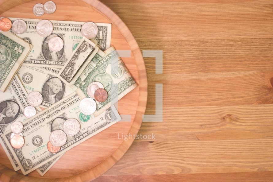 tithe bowl with money 