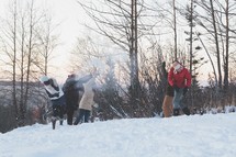 snowball fight in winter snow 