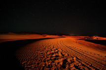 desert sand dunes and tracks in the sand 