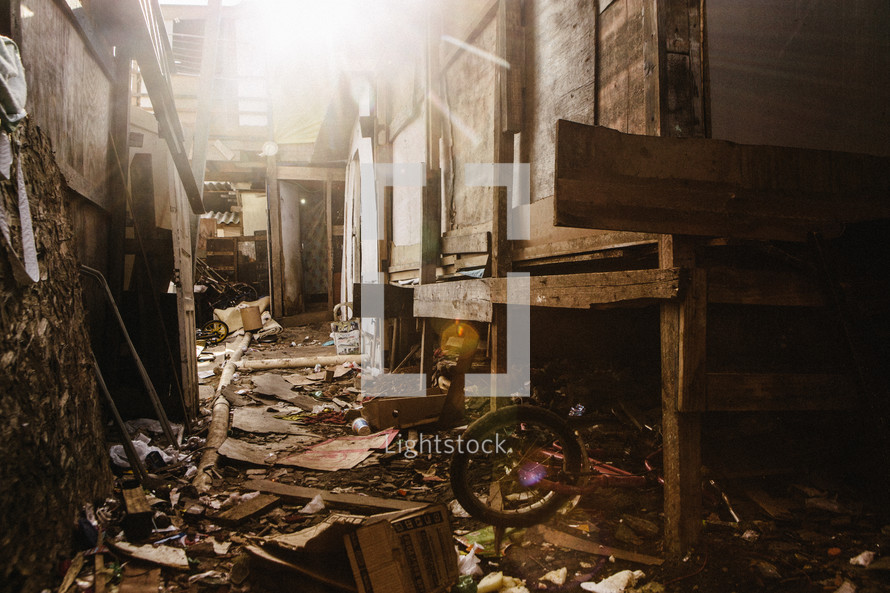 debris and trash on the floor in an abandoned building 
