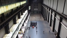 LONDON, UK—People visiting Tate Modern art gallery.