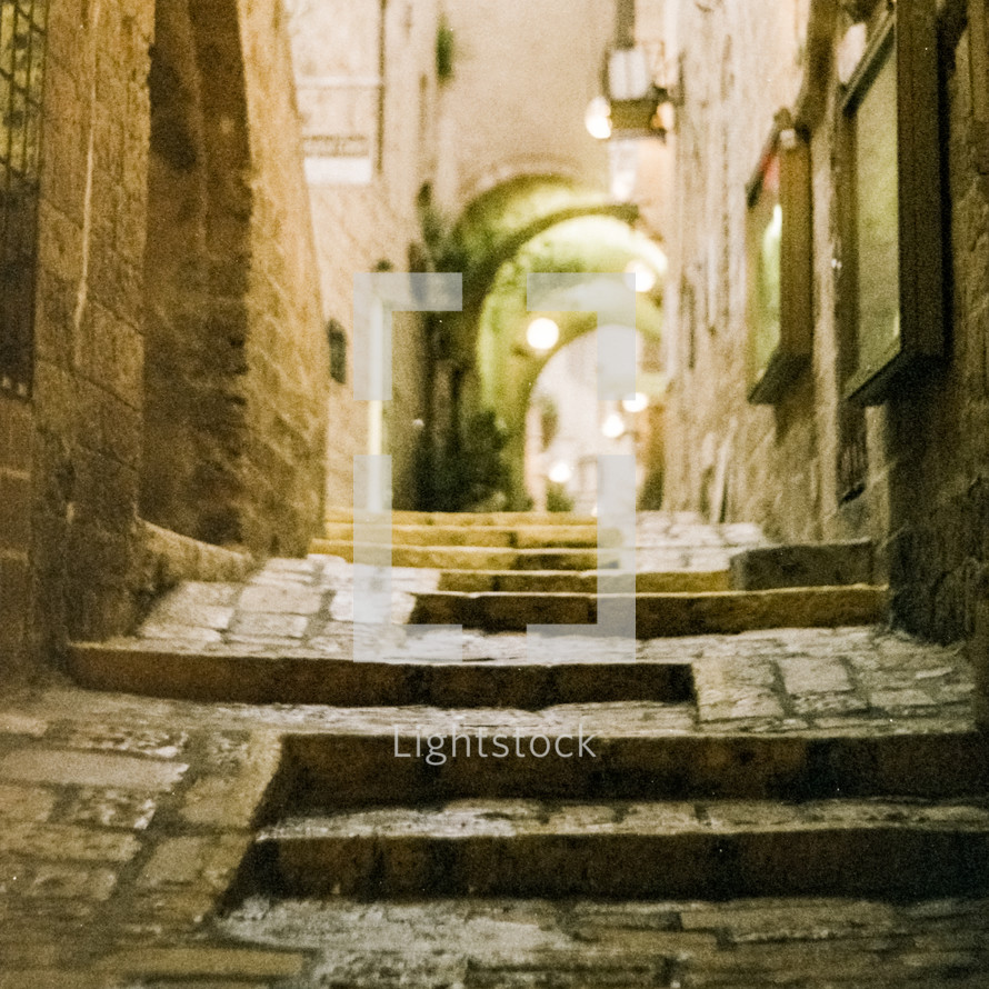 Stone steps through arched pathway in Jaffa, Israel