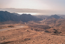 Road through desert landscape in Israel