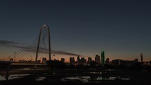 Sunrise time lapse of Margaret Hunt Hill Bridge in downtown Dallas, Texas.
