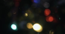 Abstract Christmas tree lights bokeh, blurred, holidays motion background.