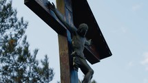 Jesus Christ in Crucifix in a mountain
