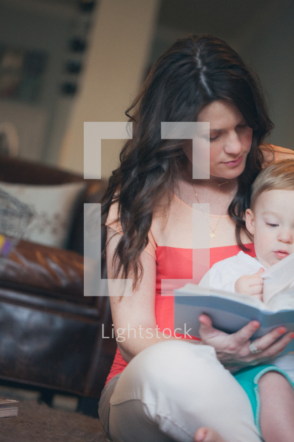 mother and toddler reading a Bible together