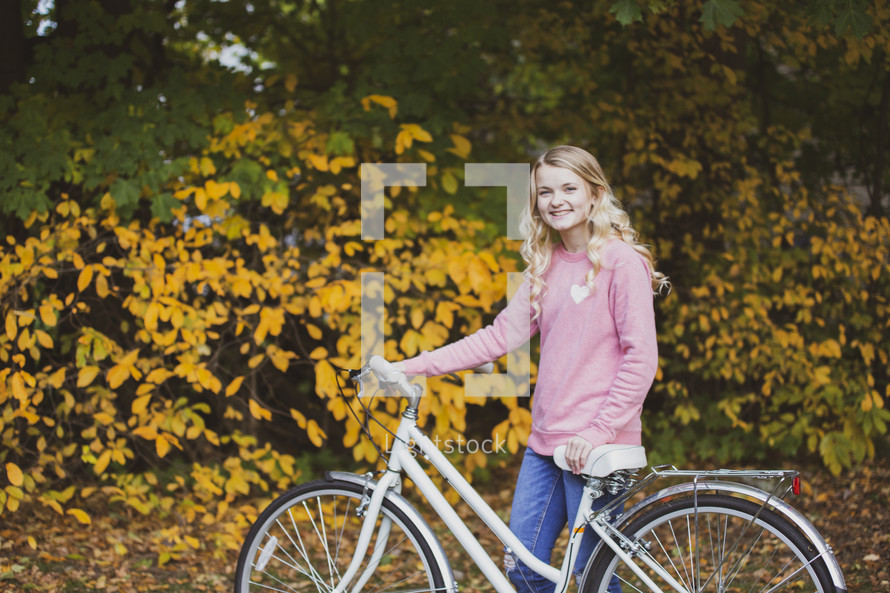 teenage girl with a bike 