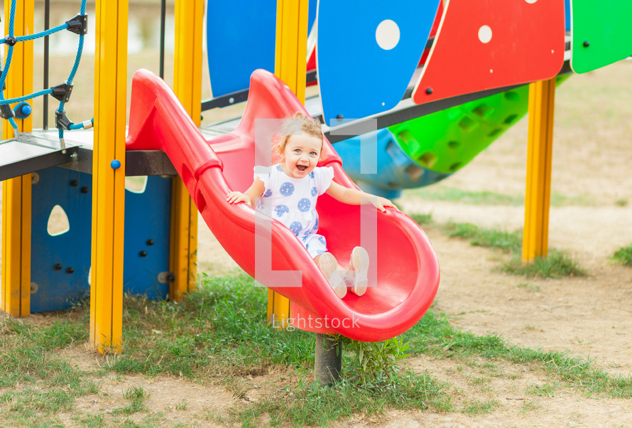 toddler girl on a playground 