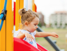 child on a slide 