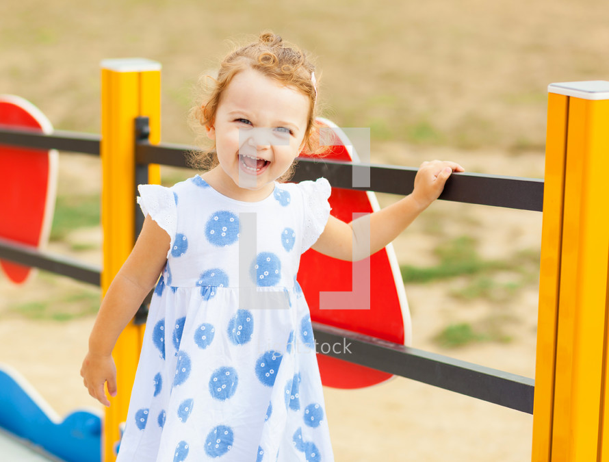 little girl on a playground 
