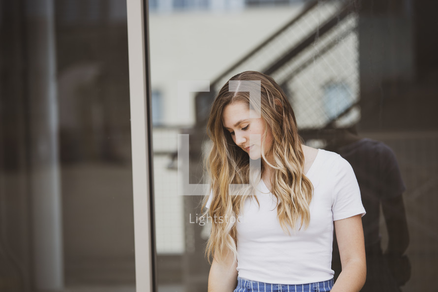 teen girl looking down 